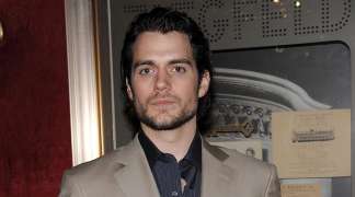 Henry Cavill goes shirtless and lights up in flames in the 'Man of Steel'