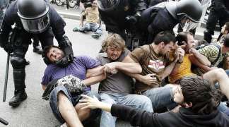 Riot police have clashed with protesters in Spain, Italy and Portugal