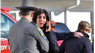 Newtown community in shock after school shooting